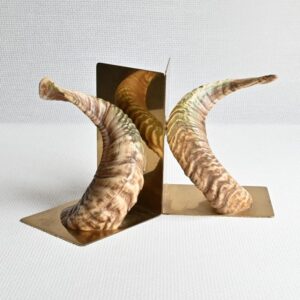 Boekensteun messing met hoorns